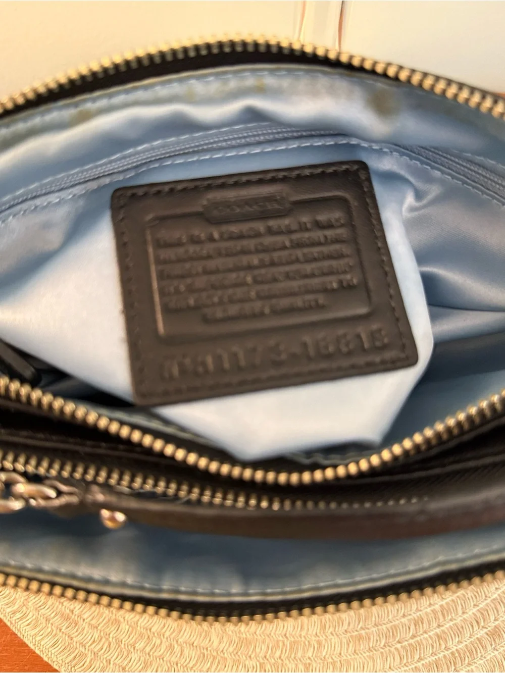 Coach sleek black